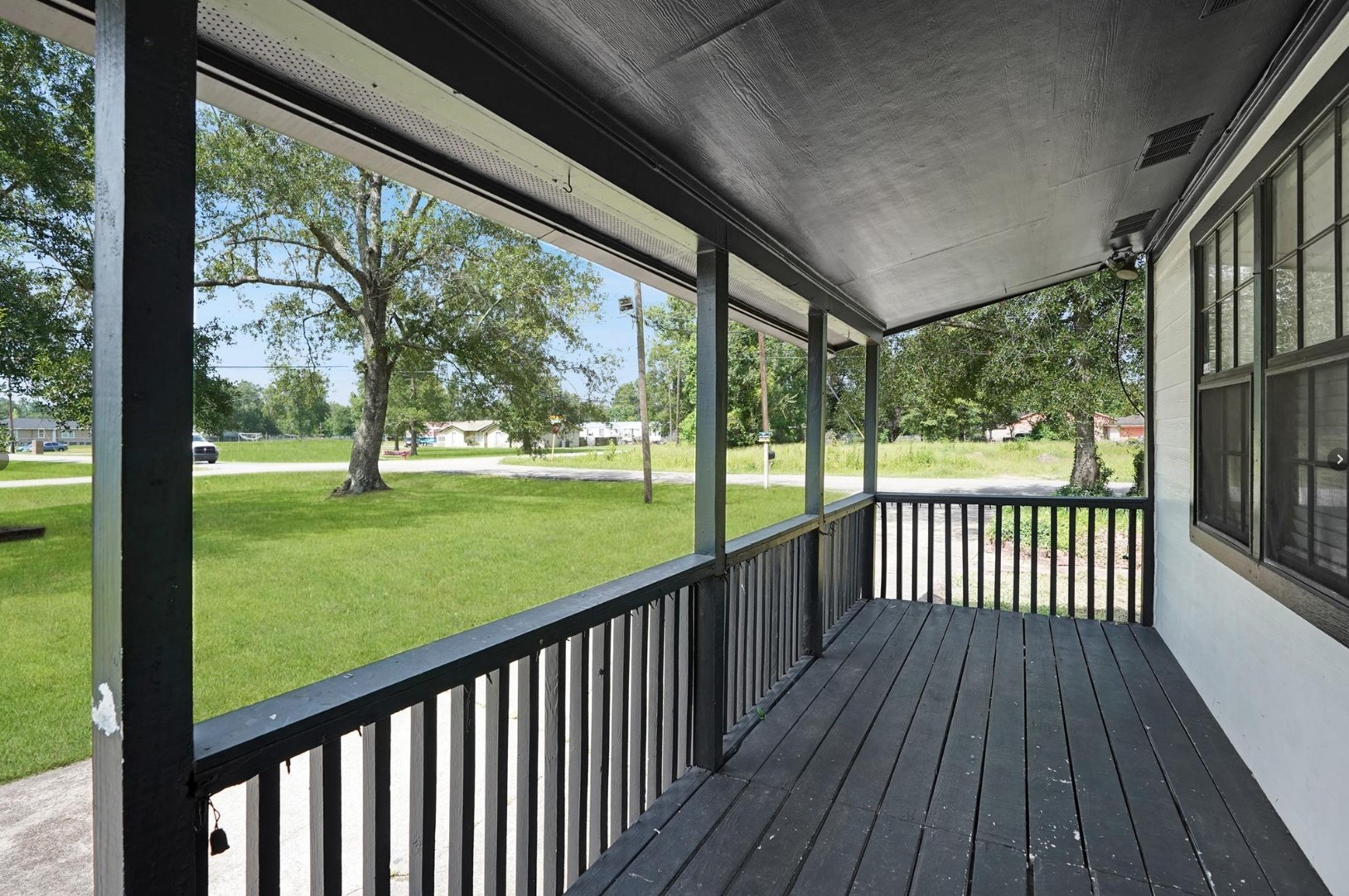 22855 East Martin Drive Porter, TX 77365 - Photo 17 of 22 a view of porch with wooden floor