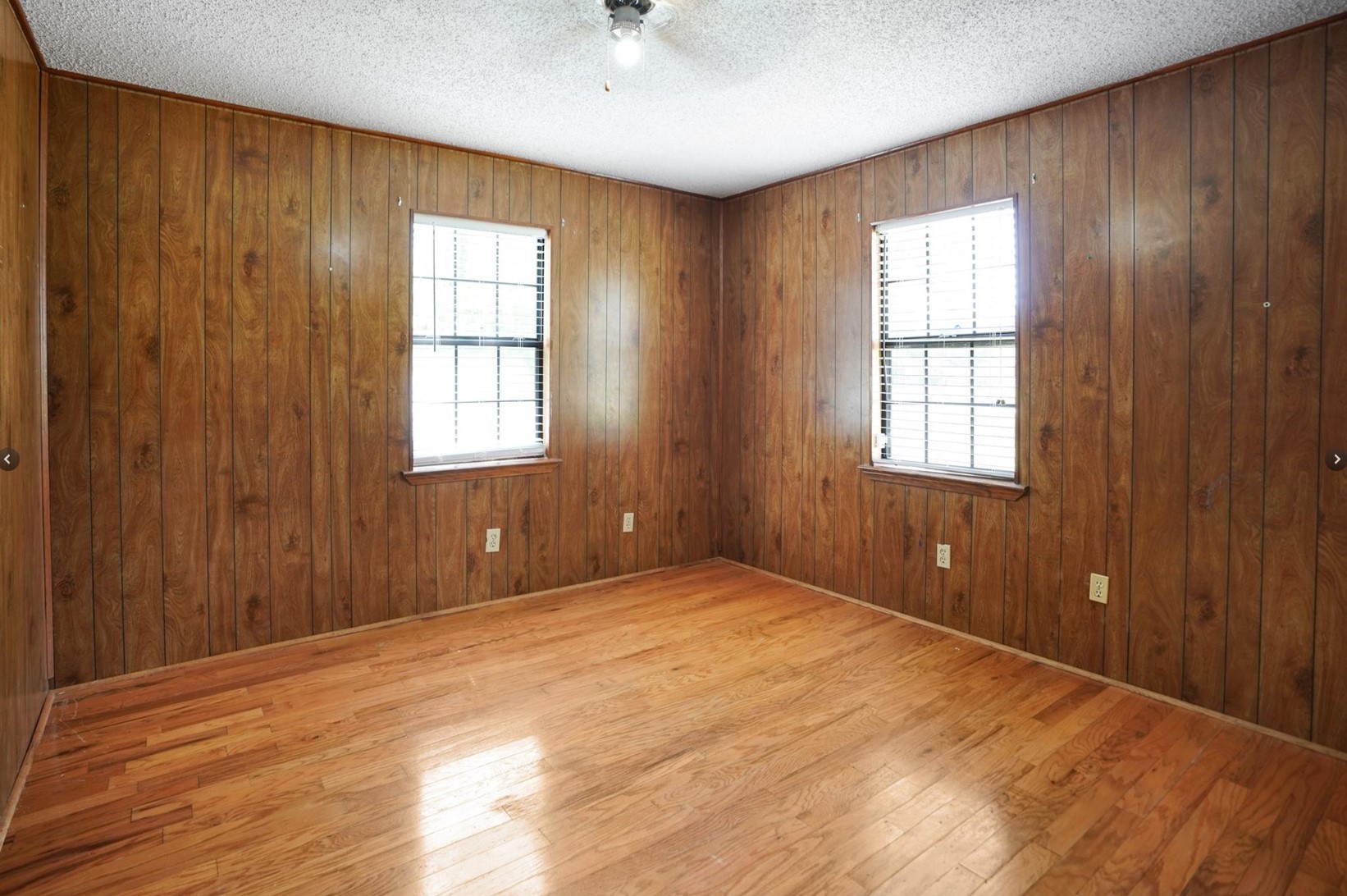22855 East Martin Drive Porter, TX 77365 - Photo 18 of 22 a view of an empty room with a window and wooden floor