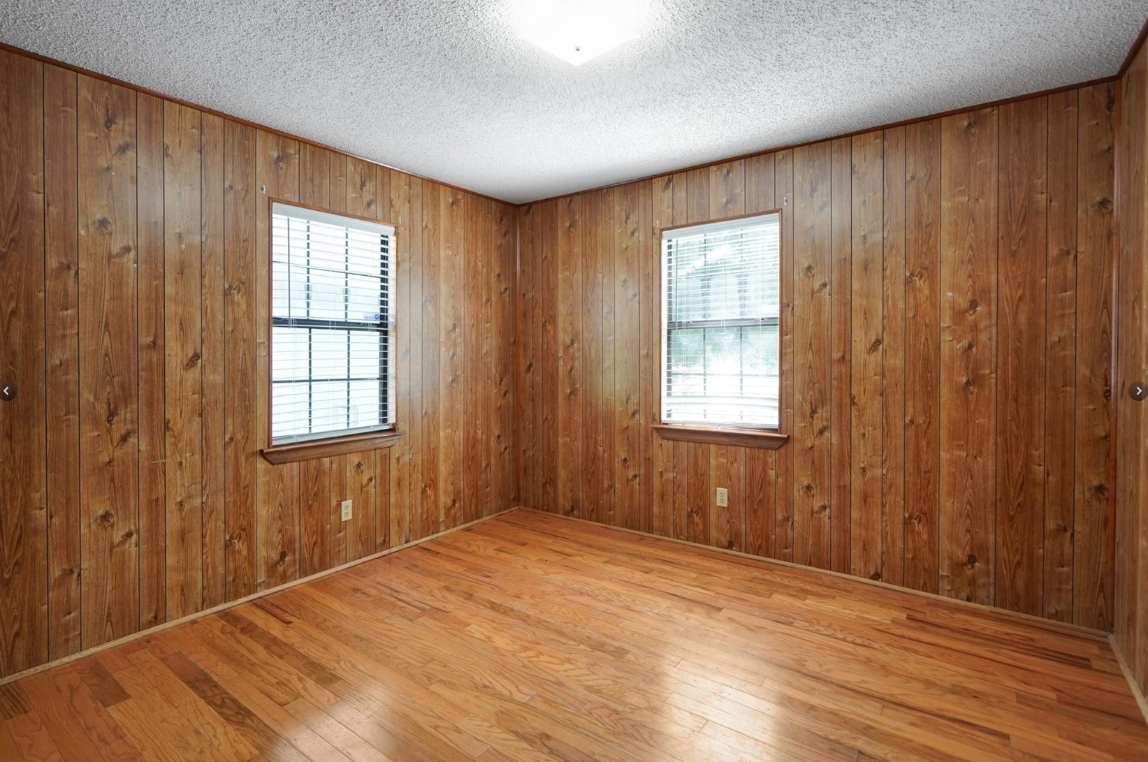 22855 East Martin Drive Porter, TX 77365 - Photo 20 of 22 a view of an empty room with wooden floor and a window