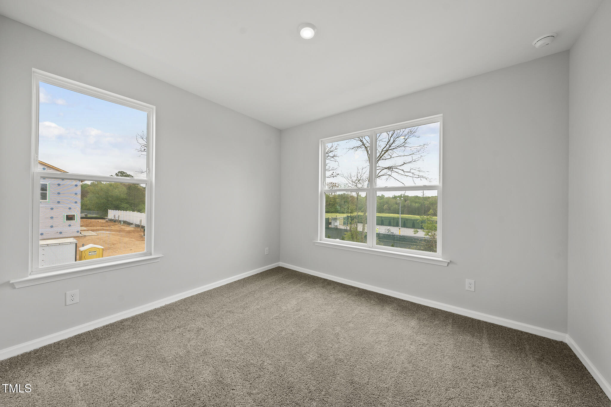 108 Ripple Way, Unit 319 Clayton, NC 27520 - Photo 14 of 42 Sun-drenched Secondary Bedrooms with 9' ceilings