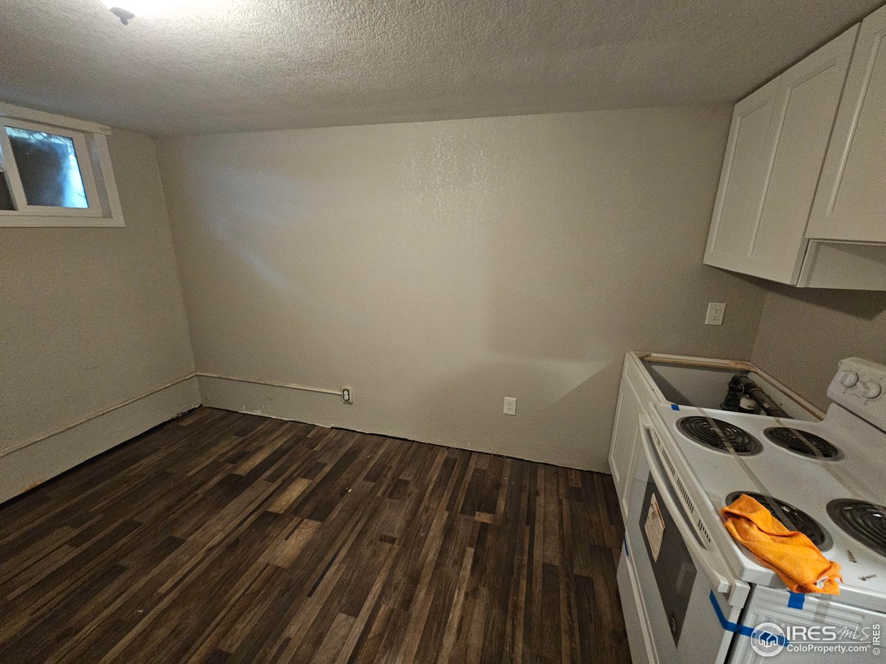 351 East 2nd Street Akron, CO 80720 - Photo 19 of 23 a view of an empty room and wooden floor