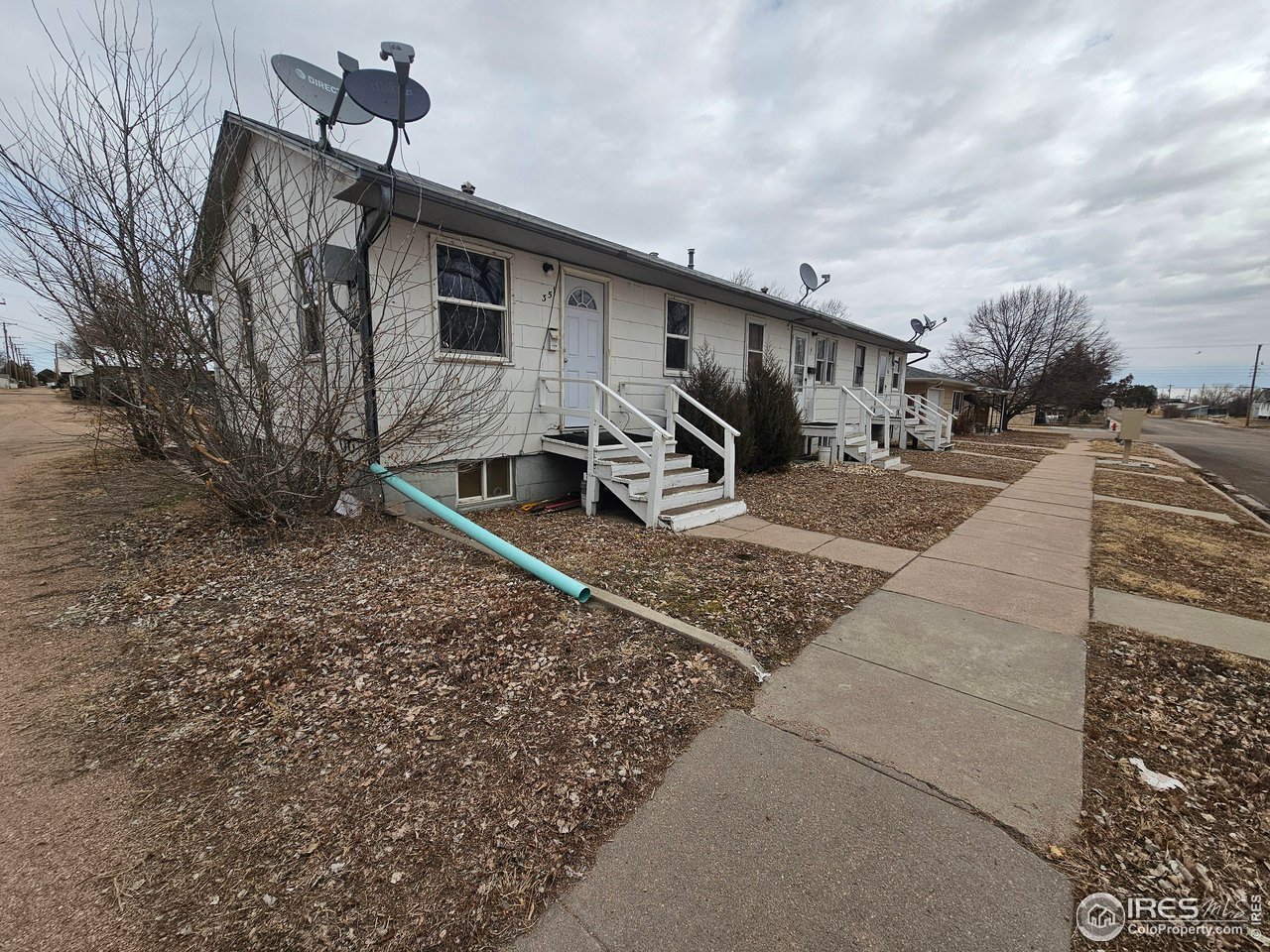 351 East 2nd Street Akron, CO 80720 - Photo 21 of 23 a view of a house with backyard