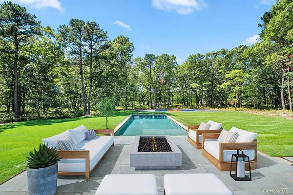 a yard with table and a chairs