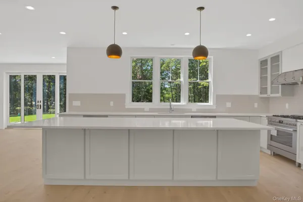 a view of kitchen with a window cabinets and outdoor space