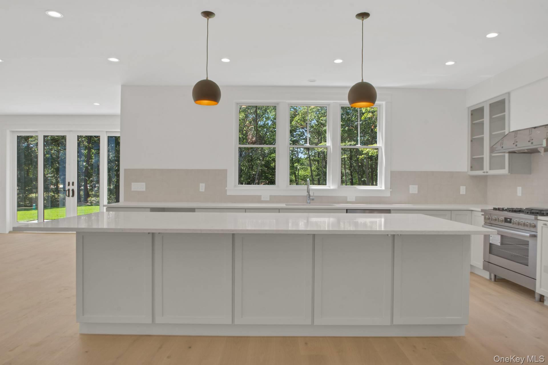 95 North Summit Boulevard Westhampton, NY 11977 - Photo 8 of 21 a view of kitchen with a window cabinets and outdoor space