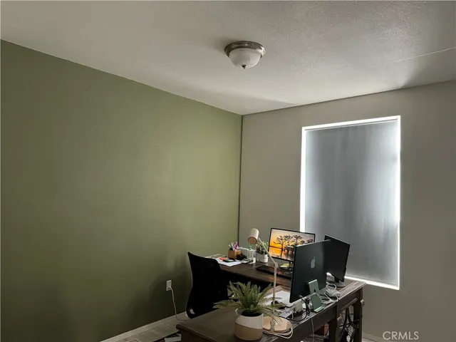 a view of swimming pool with a table and chairs