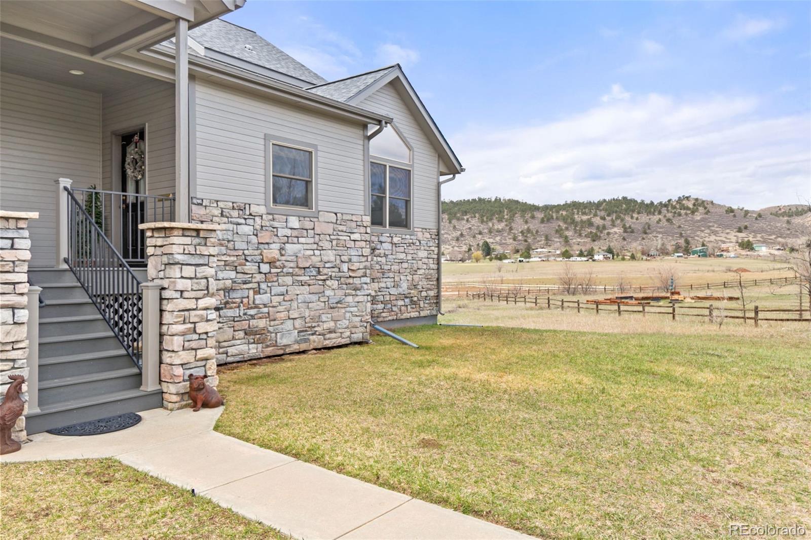 3065 Wildes Road Loveland, CO 80538 - Photo 4 of 42 a view of a balcony with an ocean