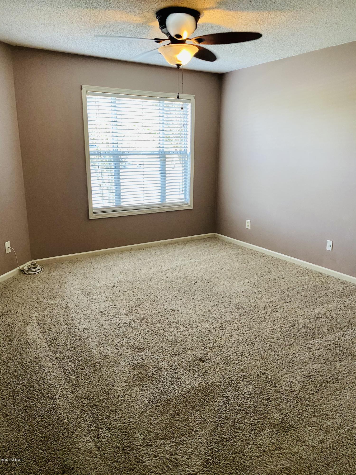 521 Spring Forest Road, Unit A Greenville, NC 27834 - Photo 13 of 19 Master Bedroom