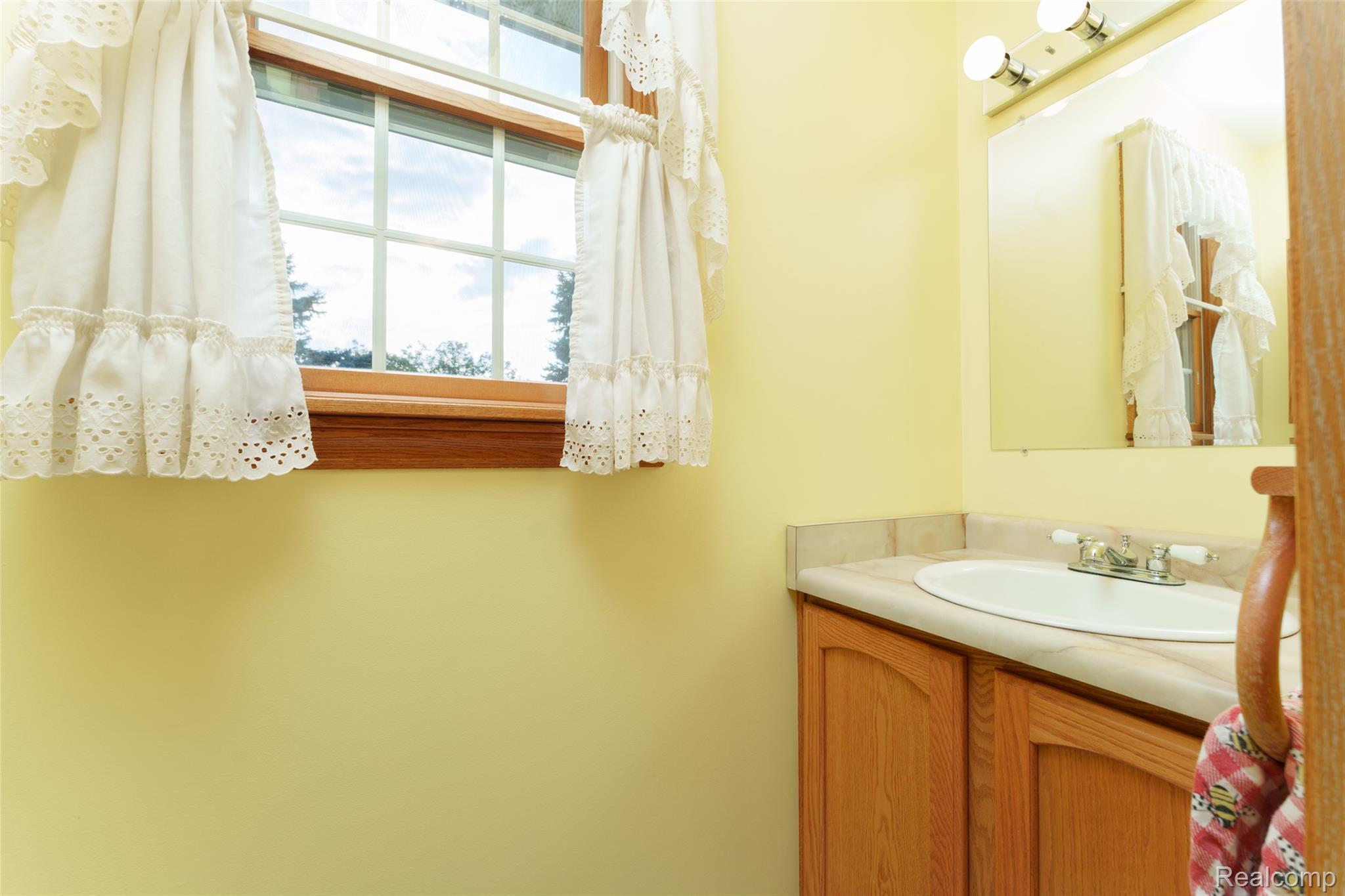 1188 South Maxfield Road Brighton, MI 48114 - Photo 11 of 24 Half bath off laundry area