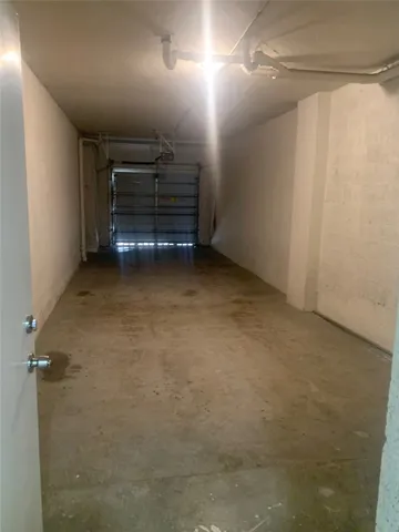 a view of room with stairs and a ceiling fan