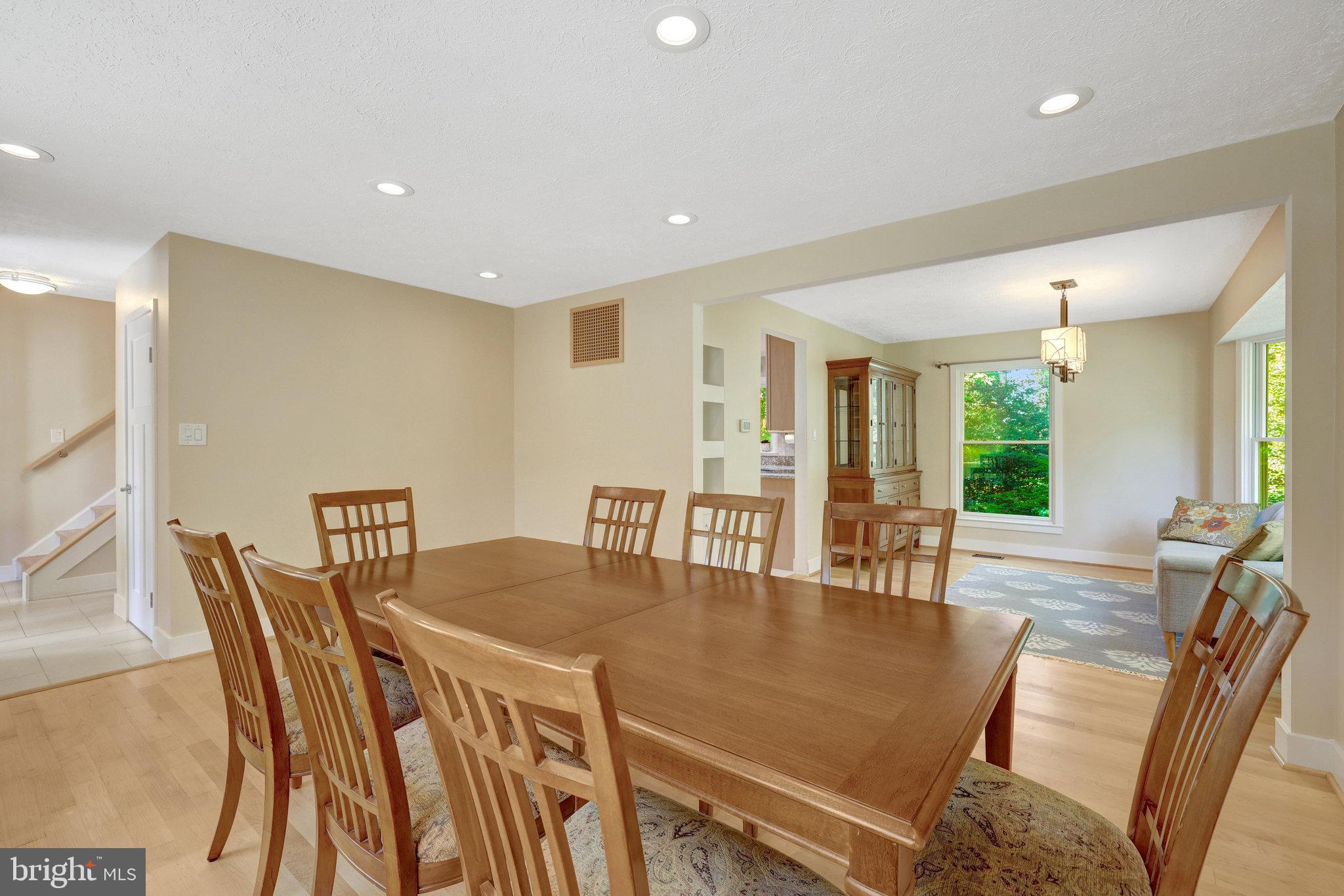 11637 Quail Ridge Court Reston, VA 20194 - Photo 18 of 46 a view of a dining room with furniture window and wooden floor