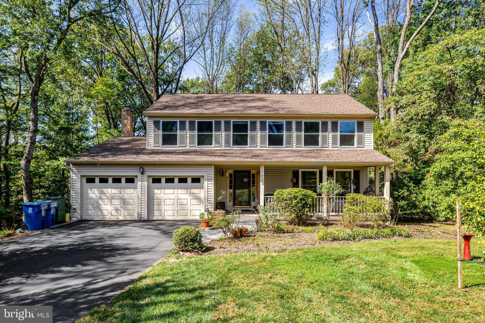 11637 Quail Ridge Court Reston, VA 20194 - Photo 2 of 46 a front view of a house with yard porch and sitting area