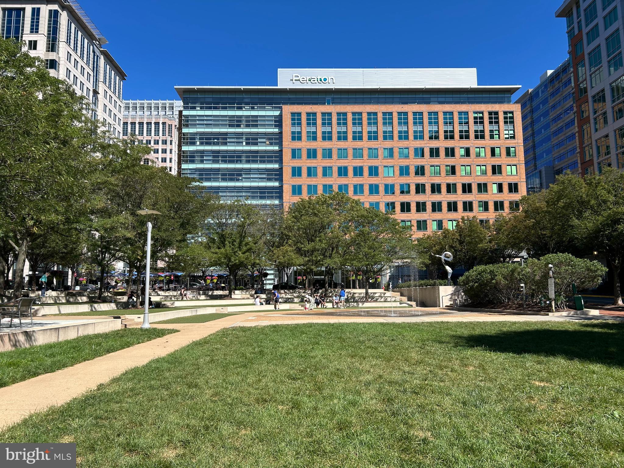 11637 Quail Ridge Court Reston, VA 20194 - Photo 41 of 46 a front view of building with yard and outdoor seating