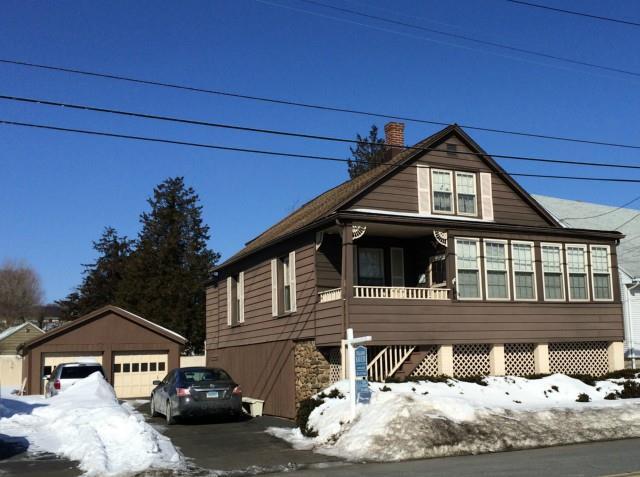 388 Old Stratfield Road Fairfield, CT 06825 - Photo 1 of 1 a front view of a house with a yard