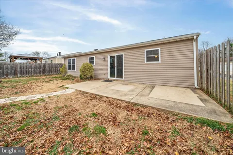 a view of a backyard of a house