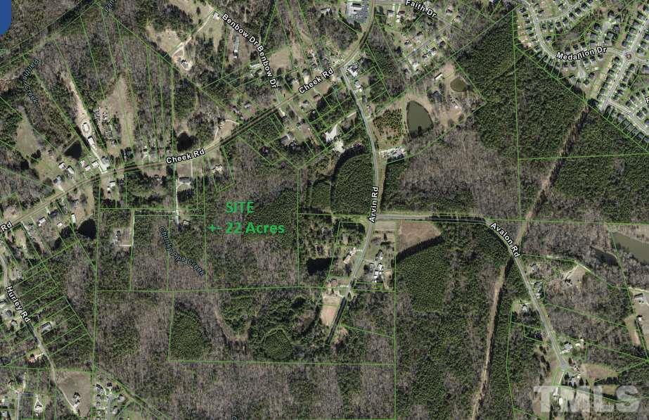 3132 Cheek Road Durham, NC 27704 - Photo 2 of 3 a view of a forest with a tree