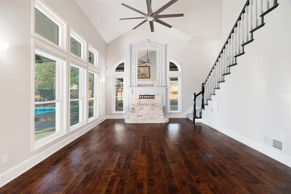 a view of an entryway with wooden floor