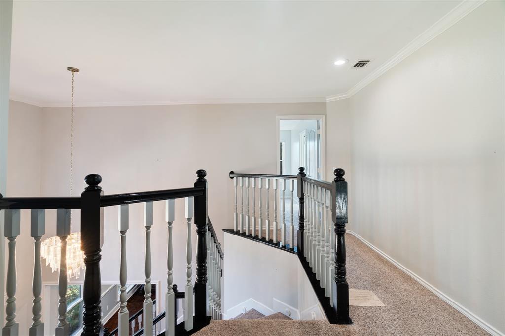 635 Cedar Creek Drive Reno, TX 75462 - Photo 19 of 32 a view of staircase with railing and white walls