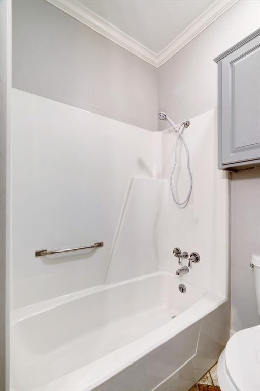 635 Cedar Creek Drive Reno, TX 75462 - Photo 24 of 32 a bathroom with a shower and a bathtub