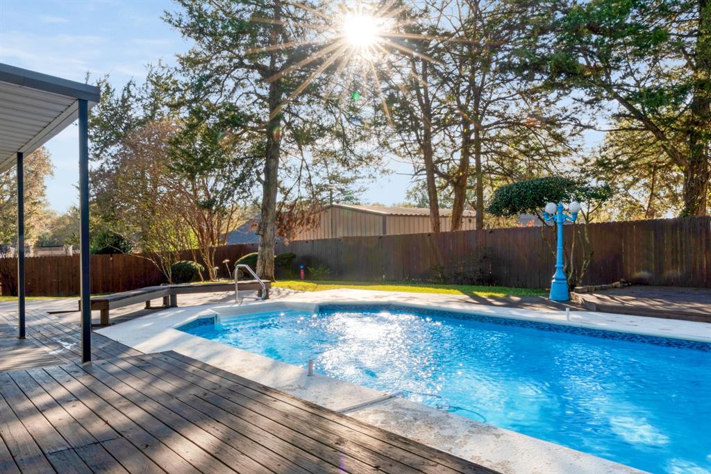 635 Cedar Creek Drive Reno, TX 75462 - Photo 27 of 32 a view of swimming pool with patio