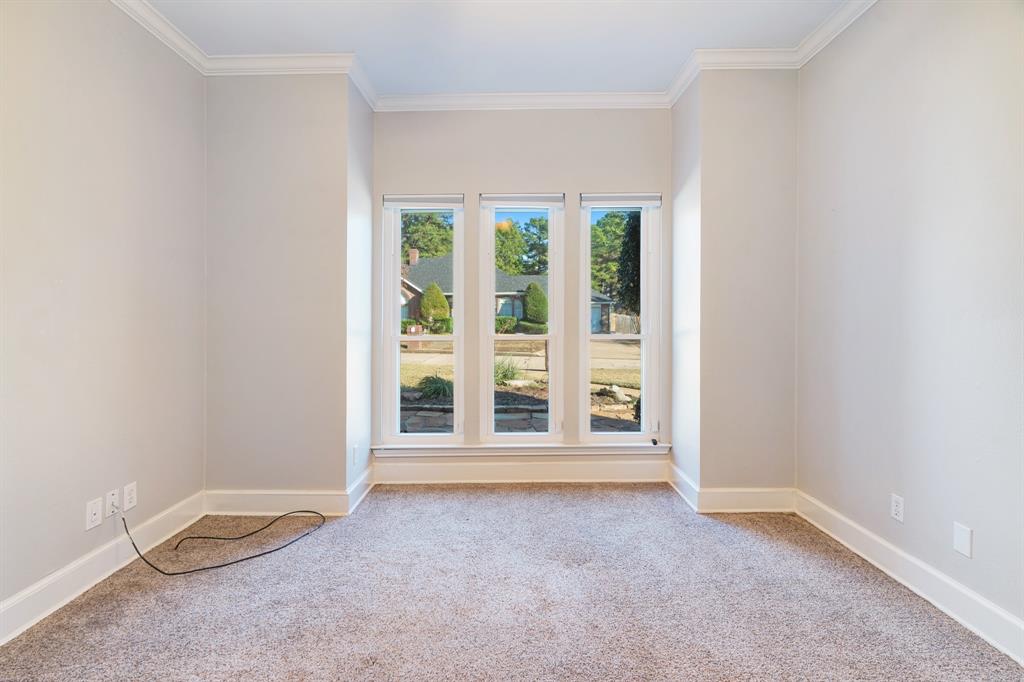 635 Cedar Creek Drive Reno, TX 75462 - Photo 6 of 32 an empty room with a window