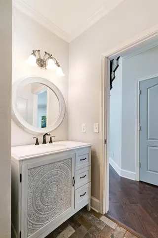 a view of an entryway with wooden floor