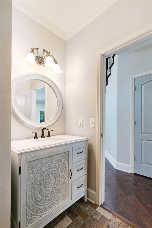 635 Cedar Creek Drive Reno, TX 75462 - Photo 8 of 32 a bathroom with a double vanity sink and a mirror