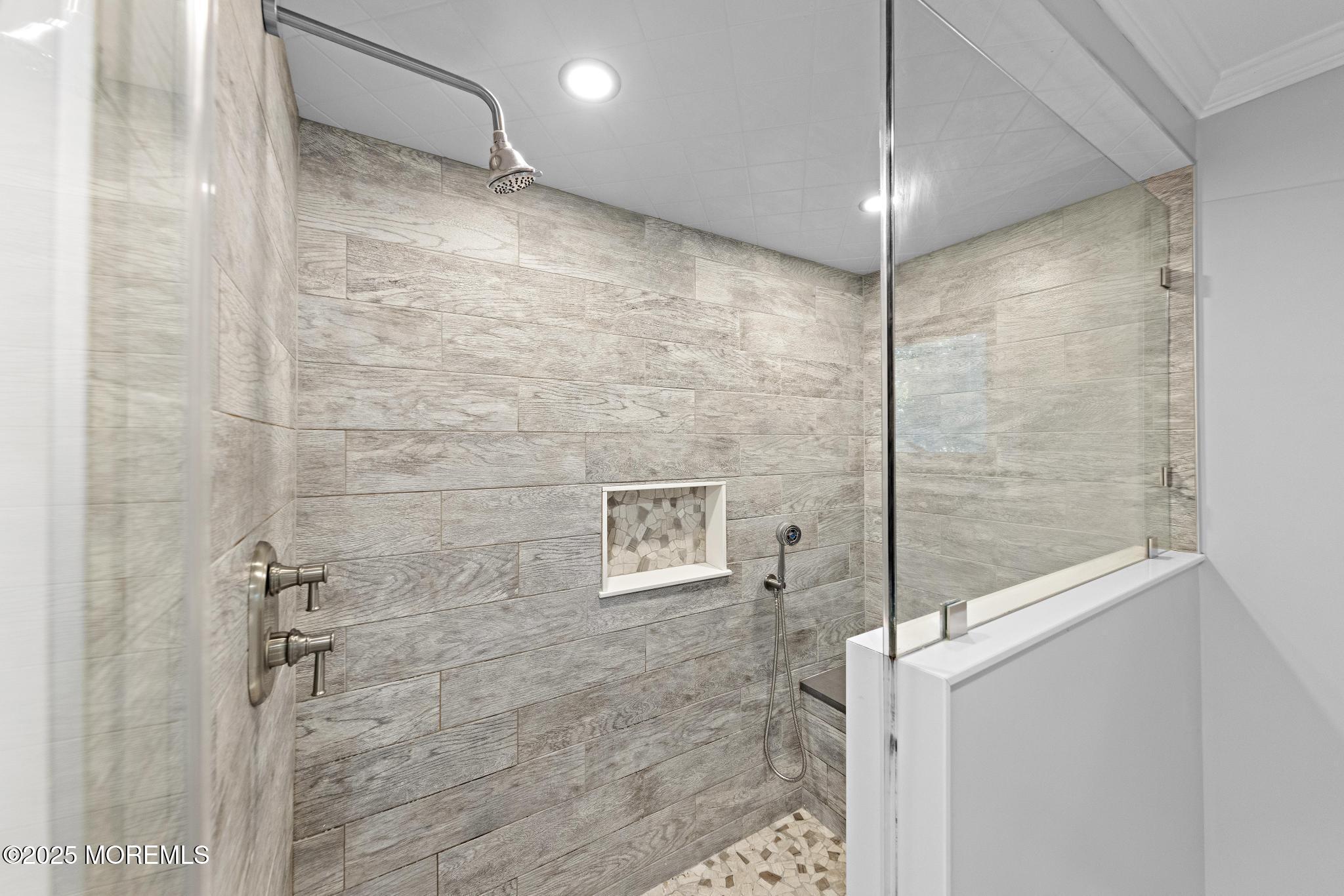 113 Parker Road West Long Branch, NJ 07764 - Photo 33 of 62 a bathroom with a shower and a glass door