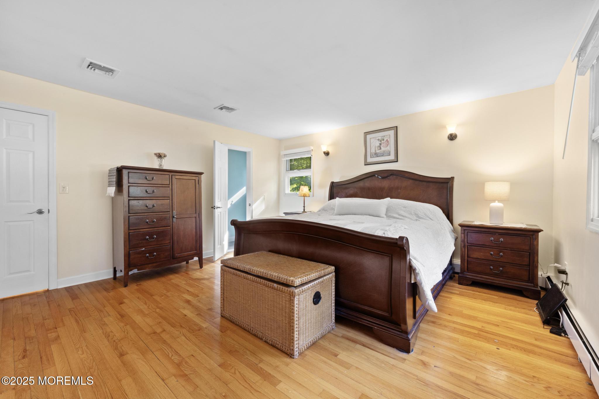 113 Parker Road West Long Branch, NJ 07764 - Photo 34 of 62 a bedroom with a bed and a dresser