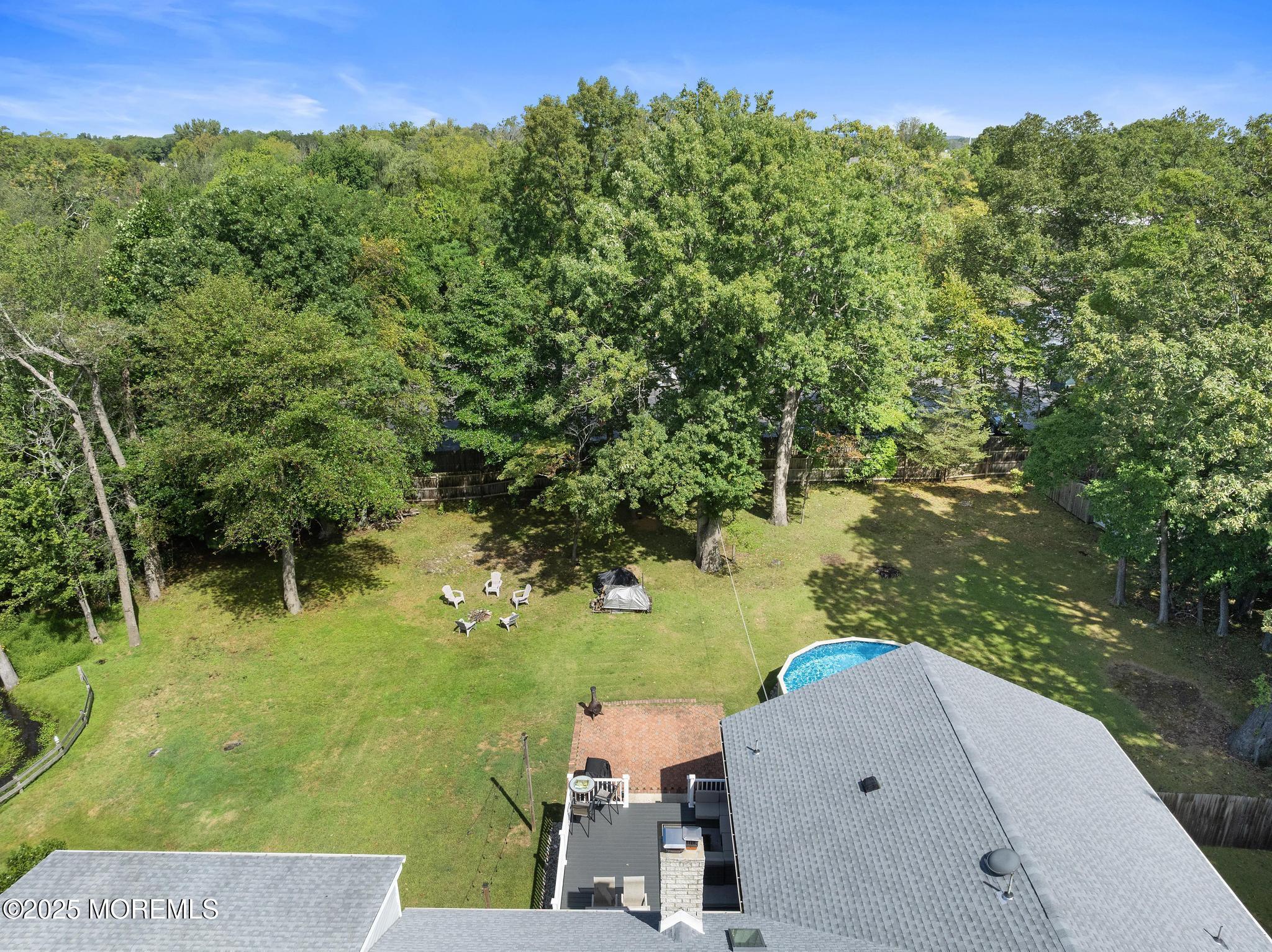 113 Parker Road West Long Branch, NJ 07764 - Photo 55 of 62 a view of a lake with a house in the background