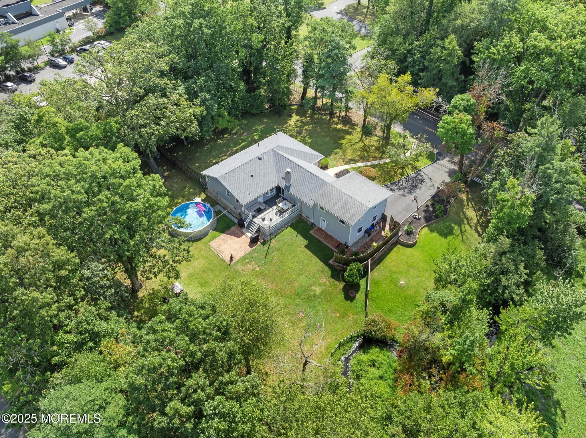 113 Parker Road West Long Branch, NJ 07764 - Photo 57 of 62 an aerial view of a house with a yard