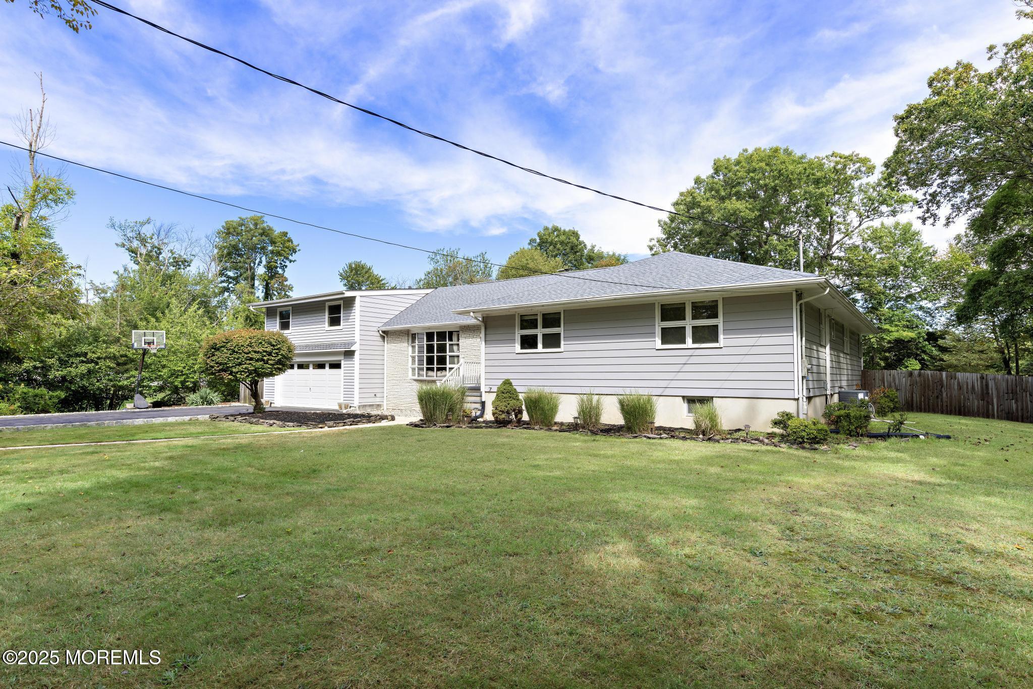 113 Parker Road West Long Branch, NJ 07764 - Photo 6 of 62 a view of a house with a yard