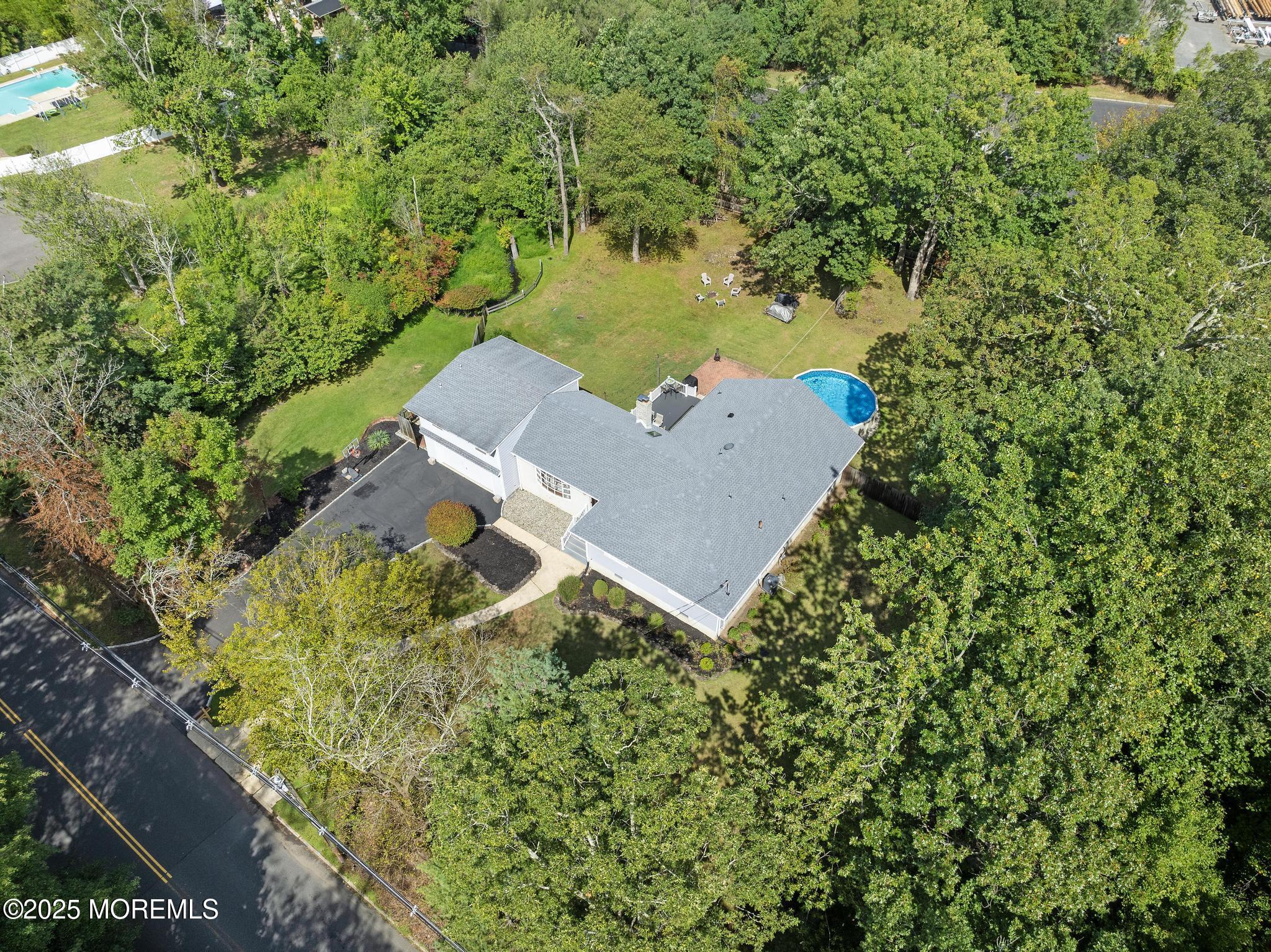 113 Parker Road West Long Branch, NJ 07764 - Photo 9 of 62 an aerial view of a house with a yard