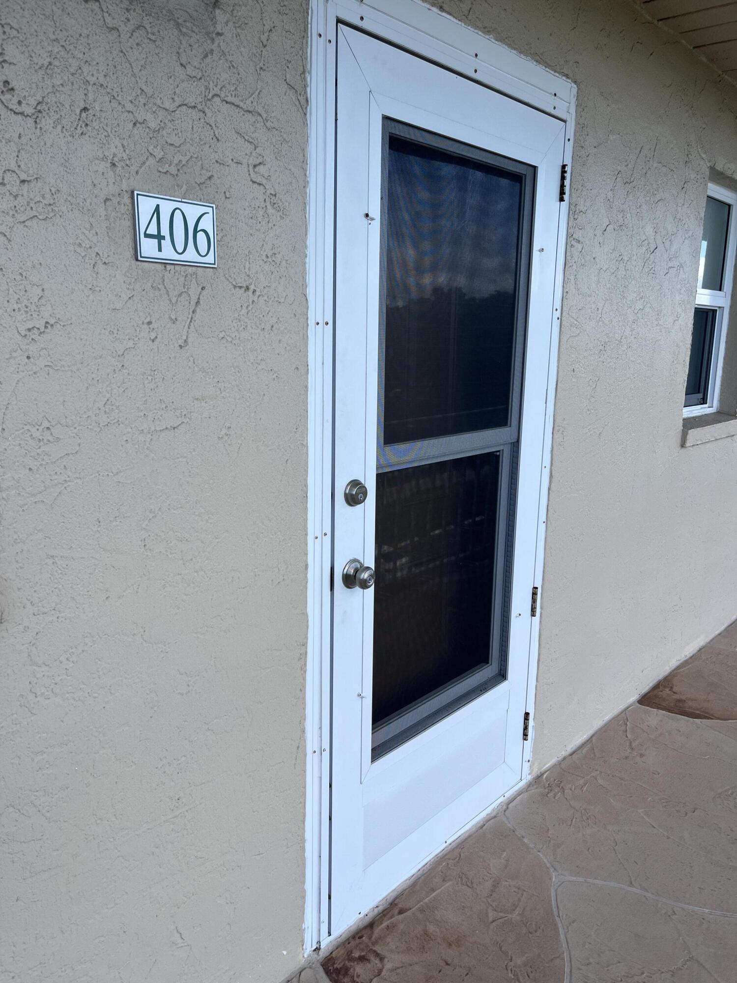 330 Northeast 26th Avenue, Unit 406 Boynton Beach, FL 33435 - Photo 16 of 33 a view of a hallway