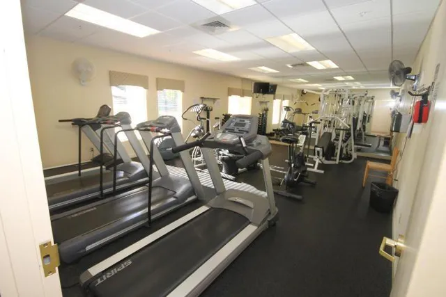 a view of a room with gym equipment