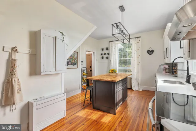 a living room with furniture and window
