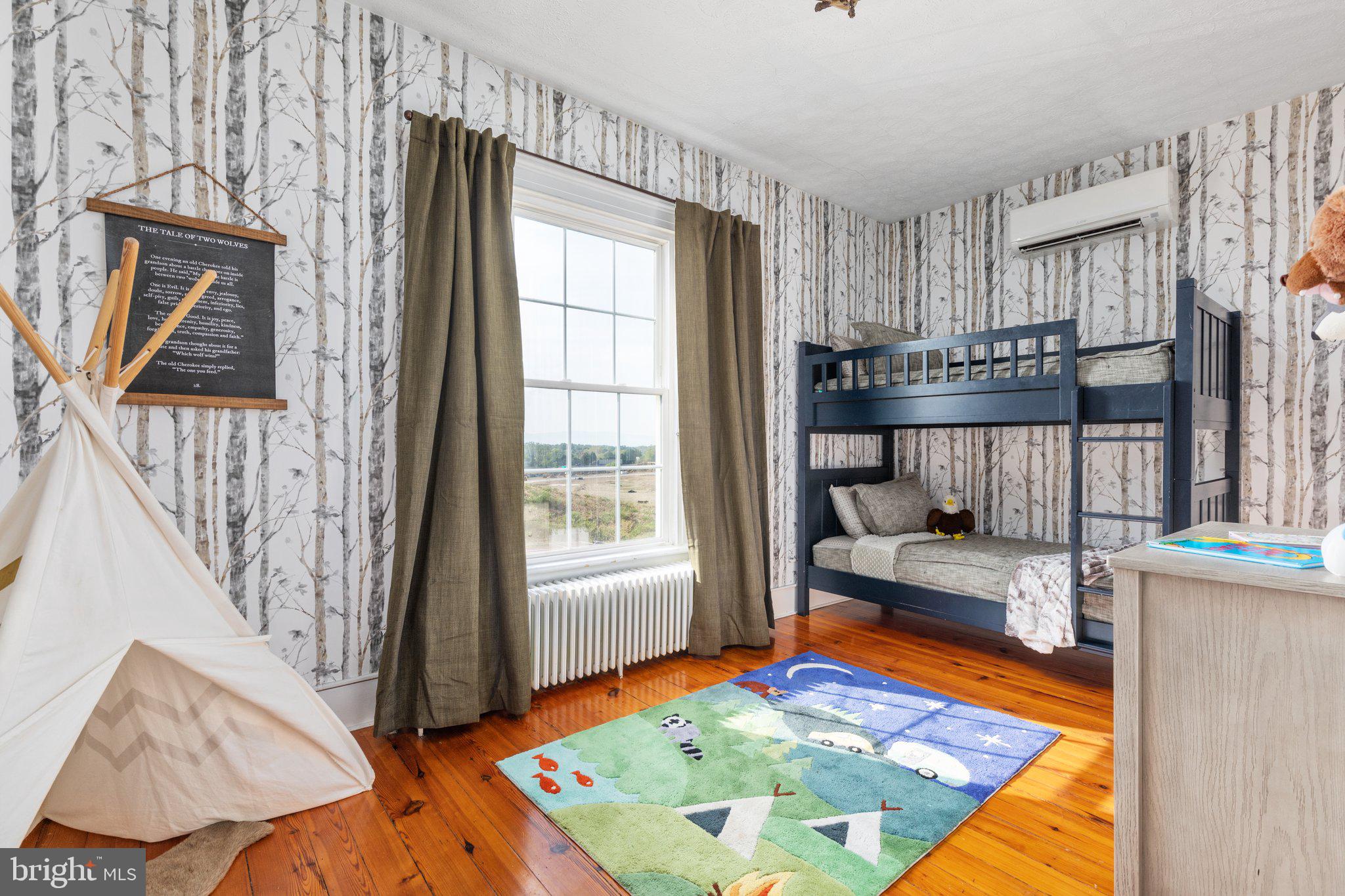 2239 6th Street Middletown, VA 22645 - Photo 35 of 60 a bedroom with furniture and a wooden floor