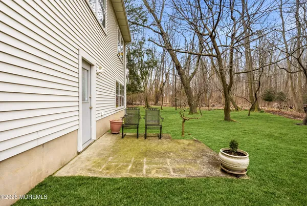 a garden view with a seating space