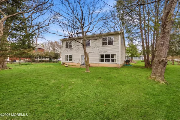 a view of a house with a big yard