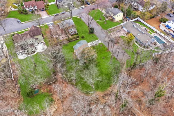 a aerial view of multi story residential houses with outdoor space