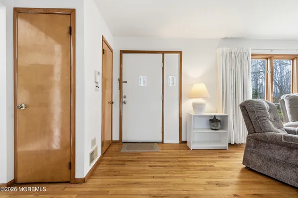 a view of livingroom with furniture and wooden floor