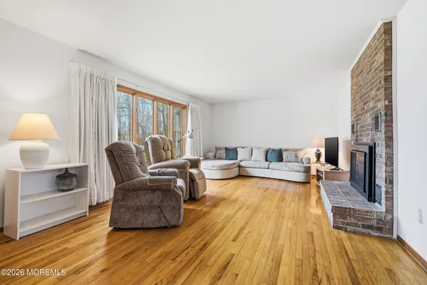 a living room with furniture and a table
