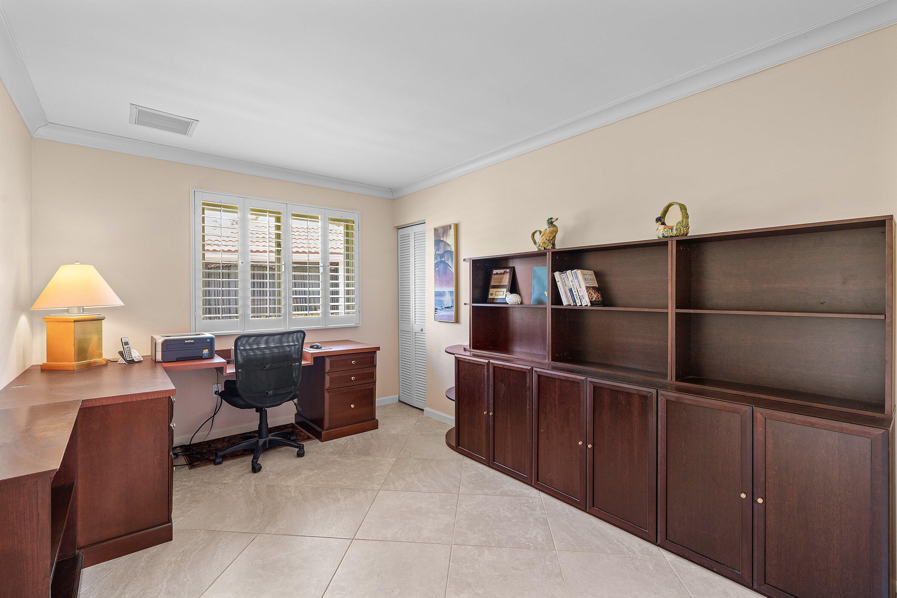 4365 Shell Drake Lane Boynton Beach, FL 33436 - Photo 25 of 56 a view of a workspace with furniture and a window