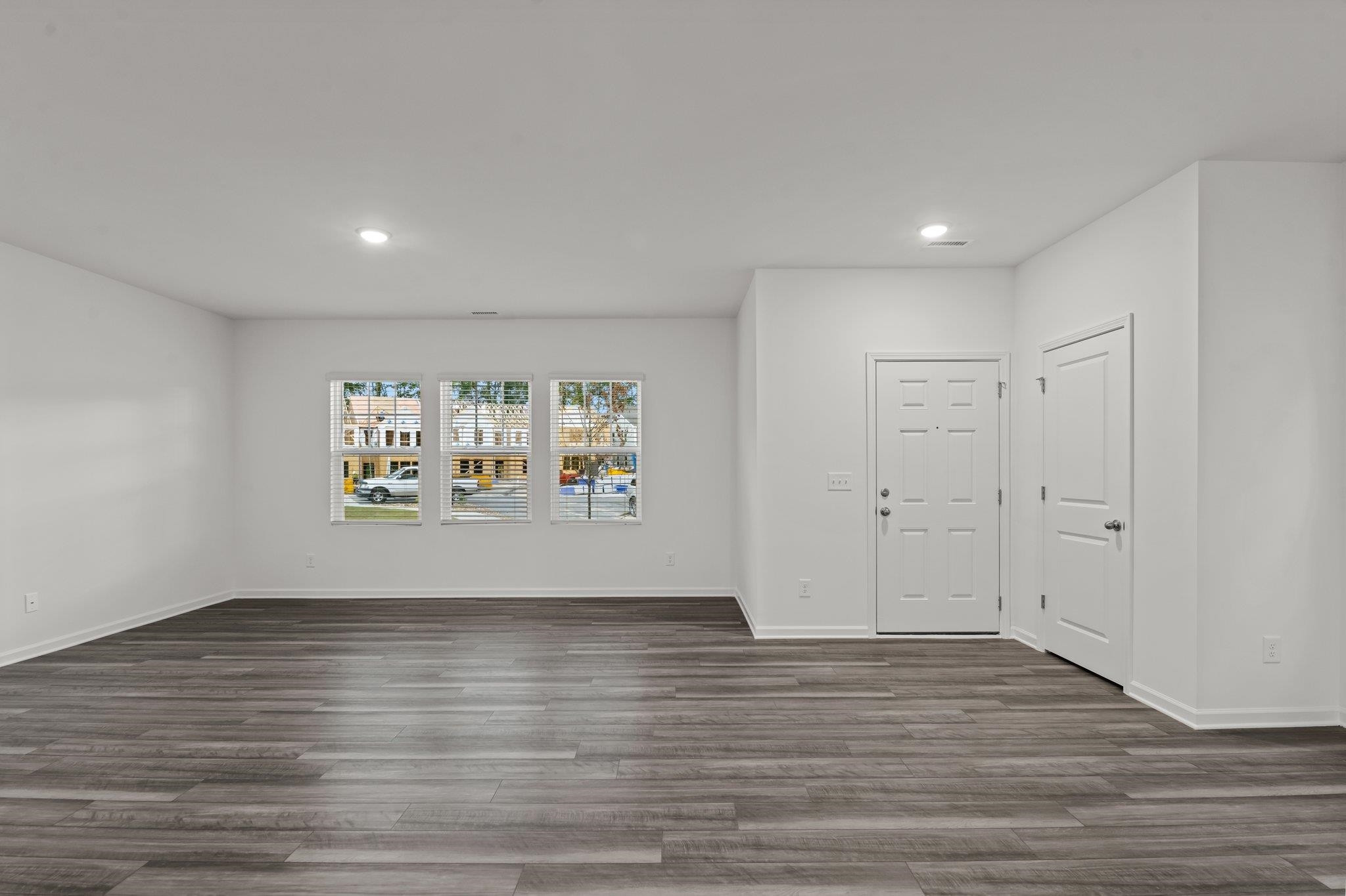 325 Spaight Acrs Way Wake Forest, NC 27587 - Photo 12 of 54 a view of room and wooden floor