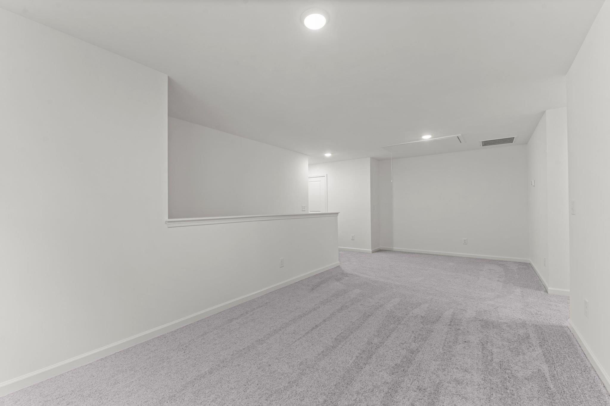 325 Spaight Acrs Way Wake Forest, NC 27587 - Photo 20 of 54 a view of an empty room