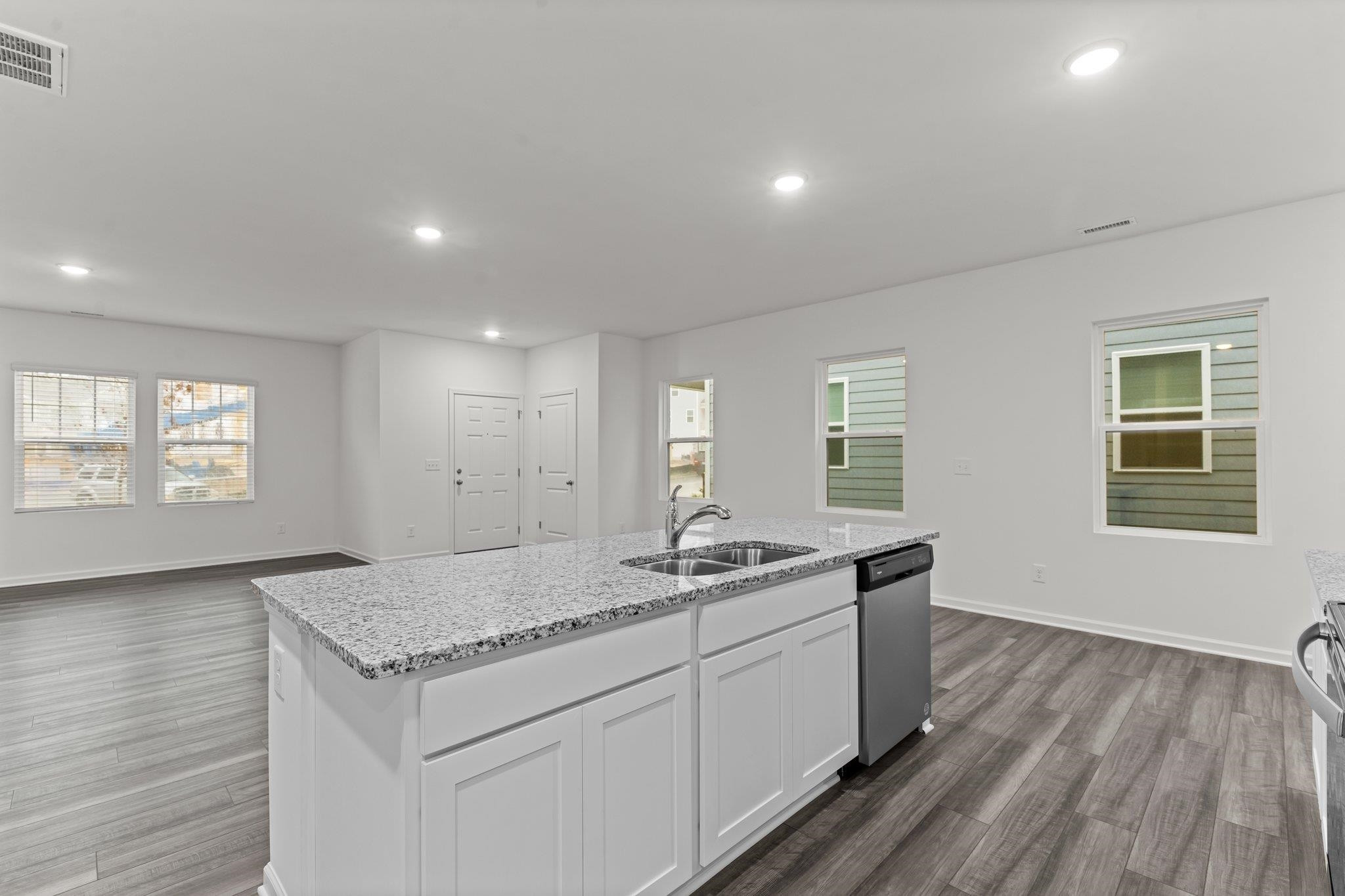 325 Spaight Acrs Way Wake Forest, NC 27587 - Photo 3 of 54 a kitchen with a sink and cabinet