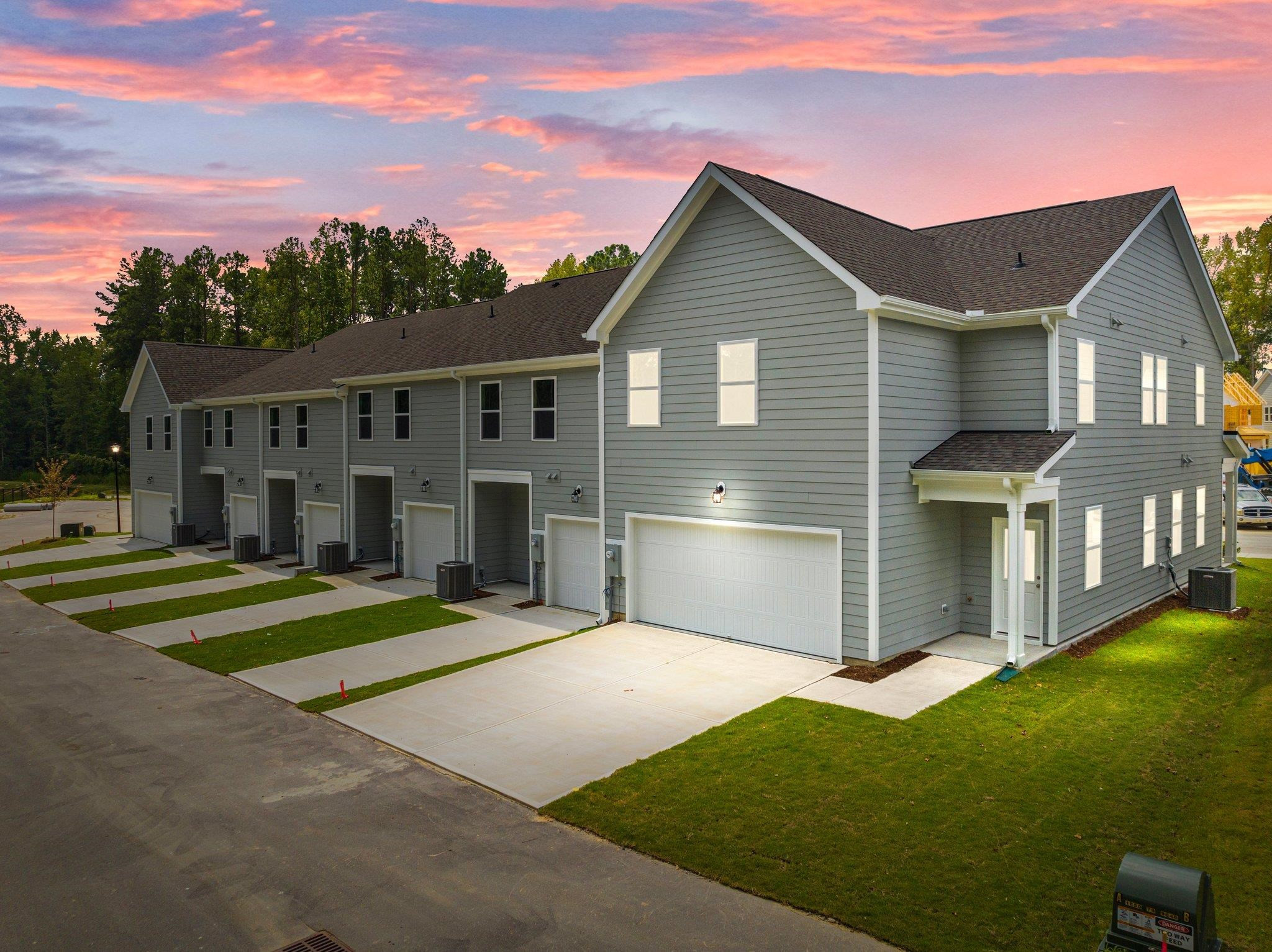 325 Spaight Acrs Way Wake Forest, NC 27587 - Photo 31 of 54 a front view of a house with a yard