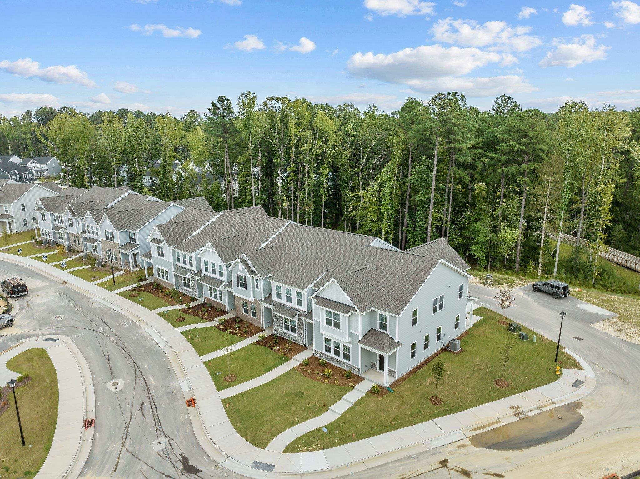 325 Spaight Acrs Way Wake Forest, NC 27587 - Photo 33 of 54 an aerial view of a house with swimming pool and mountains