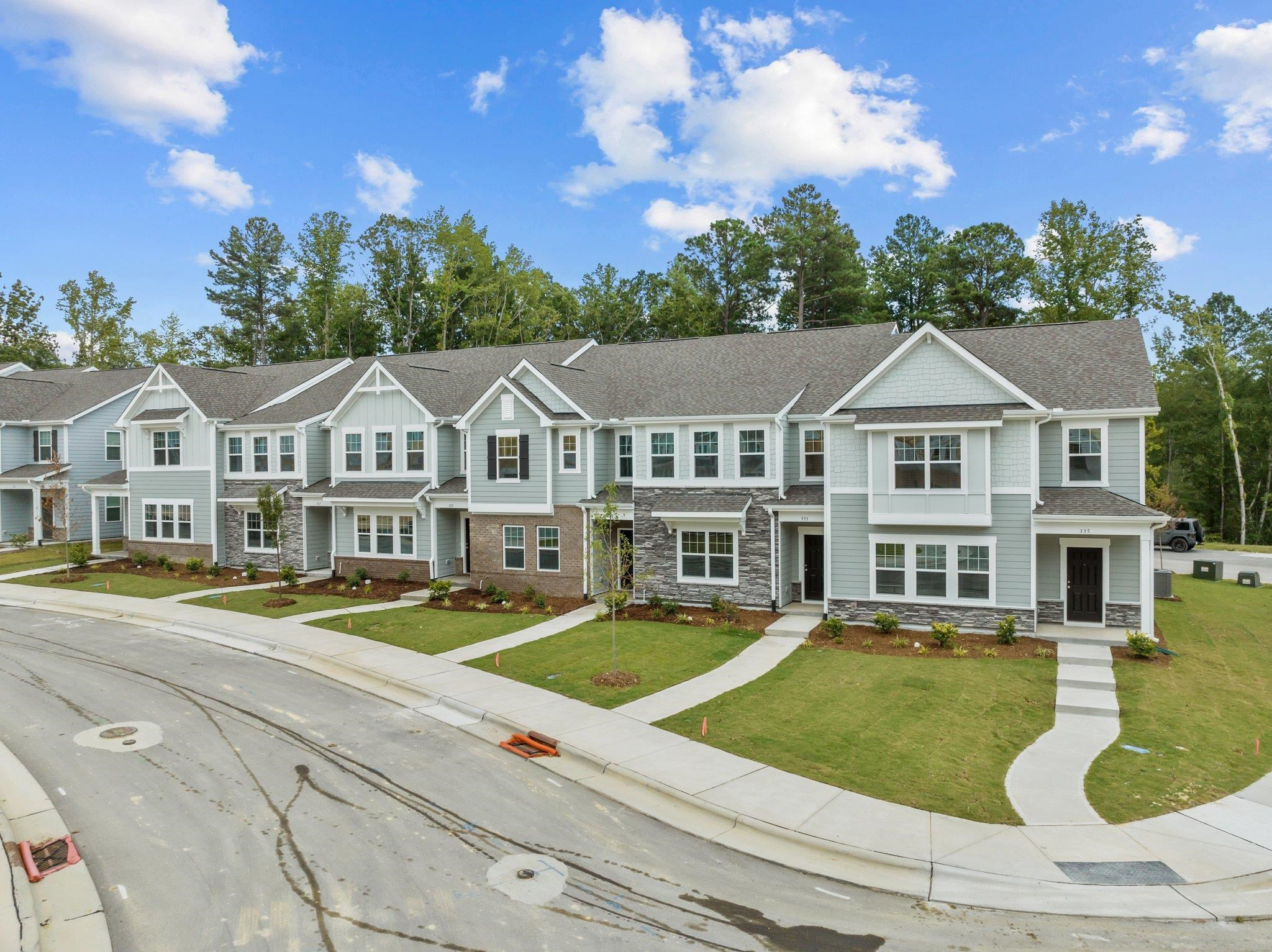 325 Spaight Acrs Way Wake Forest, NC 27587 - Photo 37 of 54 a view of an house with swimming pool and porch