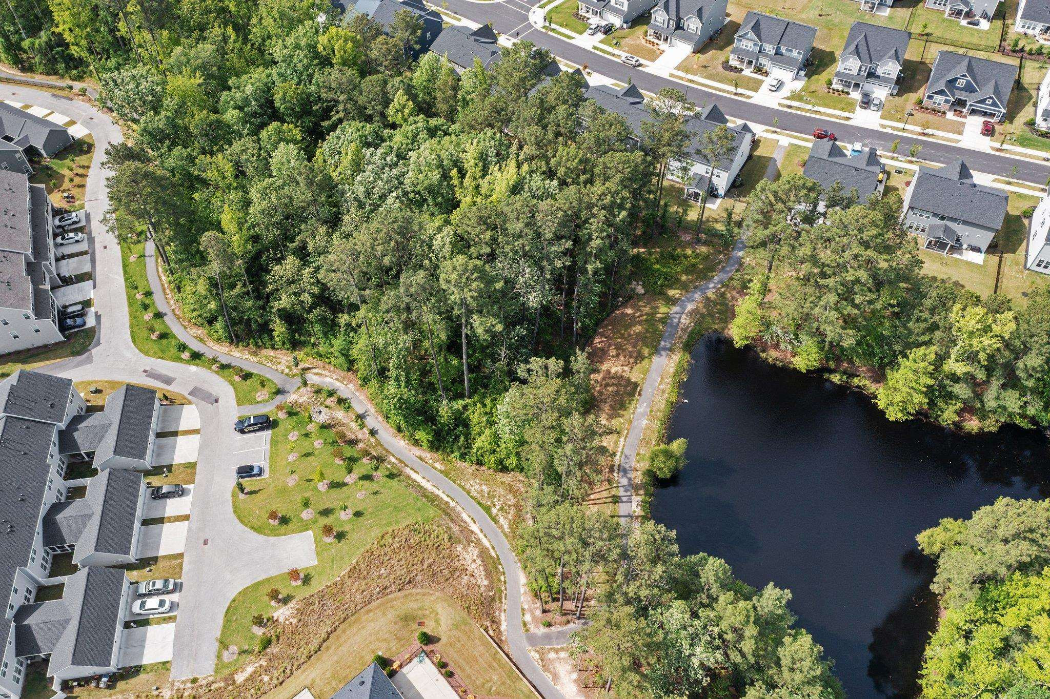 325 Spaight Acrs Way Wake Forest, NC 27587 - Photo 51 of 54 an aerial view of a house with a yard and garden